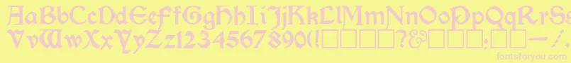 フォントKelmscottRegular – ピンクのフォント、黄色の背景
