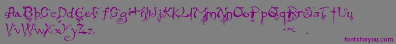 EvernightStargazer-fontti – violetit fontit harmaalla taustalla