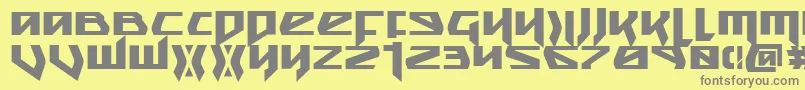 フォントSnubfighterb – 黄色の背景に灰色の文字