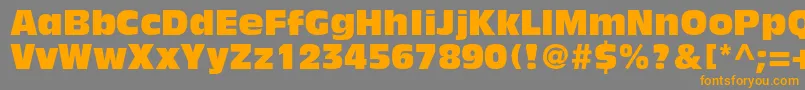 フォントAntiqueolivestdCompact – オレンジの文字は灰色の背景にあります。