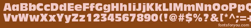 AntiqueolivestdCompact-fontti – vaaleanpunaiset fontit ruskealla taustalla