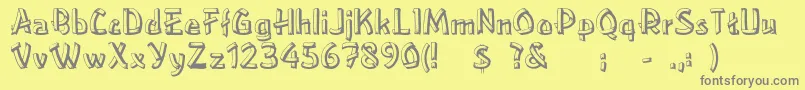 フォントLowerEastside – 黄色の背景に灰色の文字