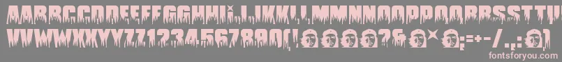 フォントGuevara ffy – 灰色の背景にピンクのフォント