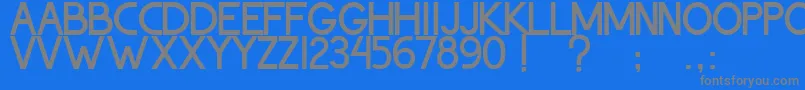 フォントThohirKeBadreah – 青い背景に灰色の文字