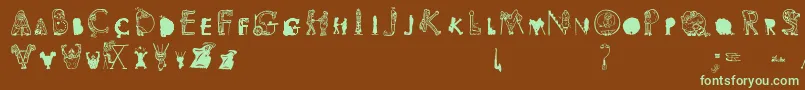 フォントViok – 緑色の文字が茶色の背景にあります。