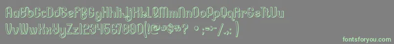 フォントLessercs – 灰色の背景に緑のフォント