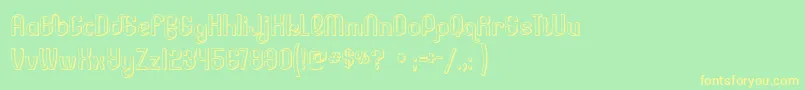 Lessercs Font – Yellow Fonts on Green Background