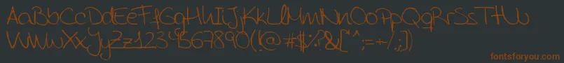 AidaGarmoScrapRounded Font – Brown Fonts on Black Background