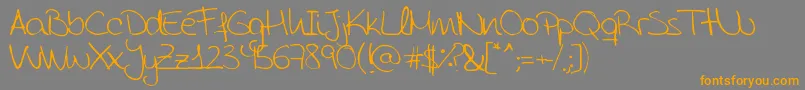 AidaGarmoScrapRounded Font – Orange Fonts on Gray Background