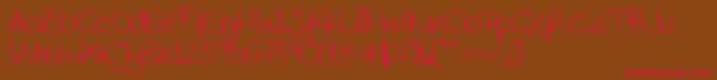 AidaGarmoScrapRounded Font – Red Fonts on Brown Background