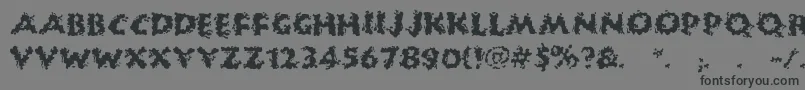 HuckleBuff-Schriftart – Schwarze Schriften auf grauem Hintergrund