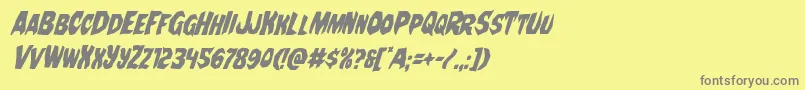 フォントNightchildecondital – 黄色の背景に灰色の文字