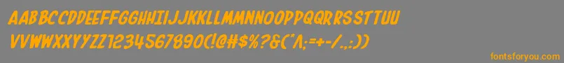 フォントInhouseeditionexpandital – オレンジの文字は灰色の背景にあります。