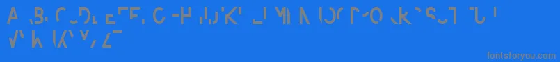 フォントAmputierte – 青い背景に灰色の文字
