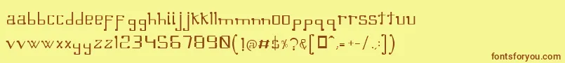 フォントOmellonsLight – 茶色の文字が黄色の背景にあります。