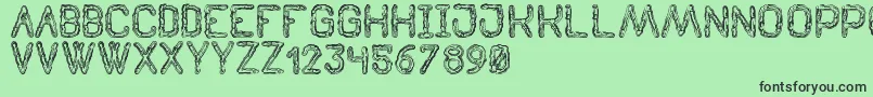 TenebrousSt Font – Black Fonts on Green Background