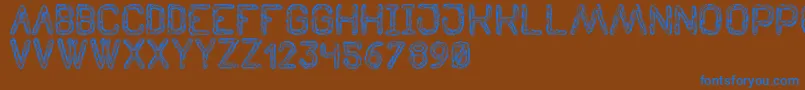 TenebrousSt Font – Blue Fonts on Brown Background