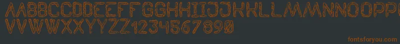 TenebrousSt Font – Brown Fonts on Black Background