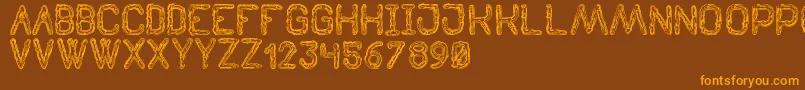 TenebrousSt-Schriftart – Orangefarbene Schriften auf braunem Hintergrund