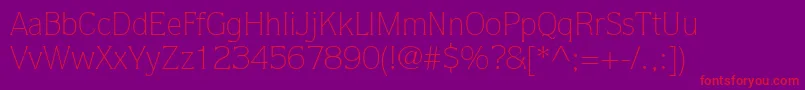 ItcQuorumLtLight-Schriftart – Rote Schriften auf violettem Hintergrund