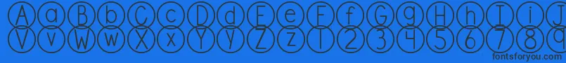 DjbStandardizedTest Font – Black Fonts on Blue Background