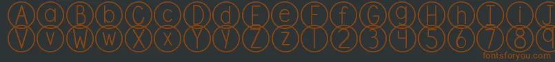 Czcionka DjbStandardizedTest – brązowe czcionki na czarnym tle