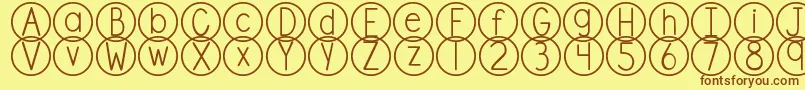 DjbStandardizedTest Font – Brown Fonts on Yellow Background