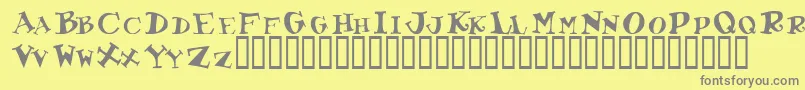 Toocoolscapssskフォントについての詳細 フォントToocoolscapsssk – 黄色の背景に灰色の文字