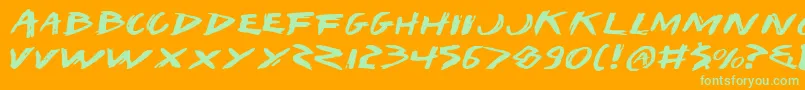 IWantMyTtrExpanded-fontti – vihreät fontit oranssilla taustalla