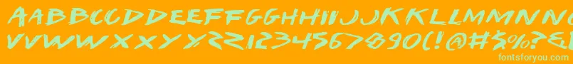 IWantMyTtrExpanded-Schriftart – Grüne Schriften auf orangefarbenem Hintergrund