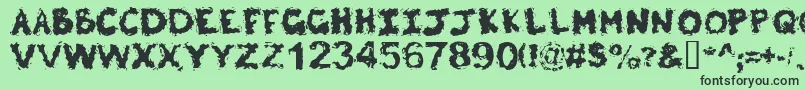 Poltergeist Font – Black Fonts on Green Background