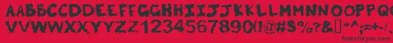 Poltergeist-Schriftart – Schwarze Schriften auf rotem Hintergrund
