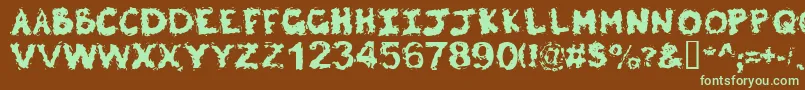 Poltergeist Font – Green Fonts on Brown Background