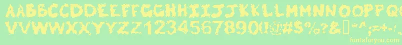 Poltergeist Font – Yellow Fonts on Green Background