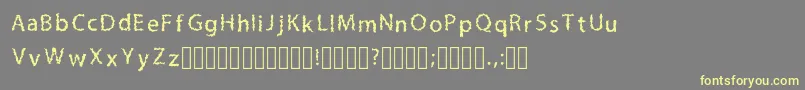 Fonte LilmessyRegular – fontes amarelas em um fundo cinza