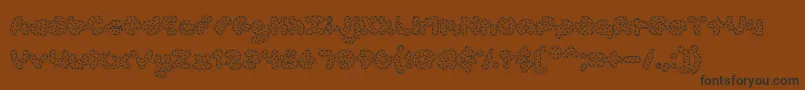 AccentCookieDough Font – Black Fonts on Brown Background