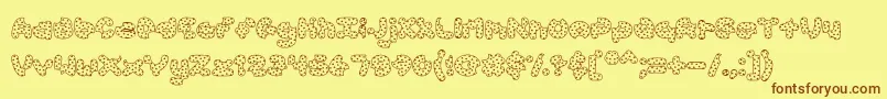 AccentCookieDough-Schriftart – Braune Schriften auf gelbem Hintergrund