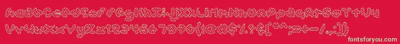 Fonte AccentCookieDough – fontes verdes em um fundo vermelho