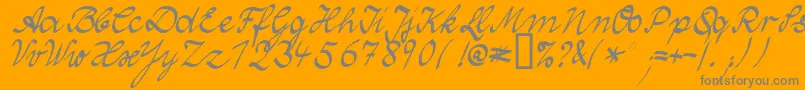 WolgastTwoNormal-Schriftart – Graue Schriften auf orangefarbenem Hintergrund