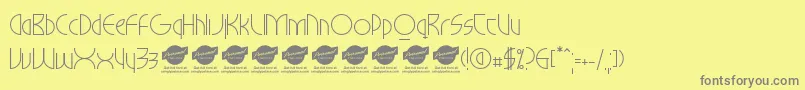 MilkywayhotelPersonaluseonly-Schriftart – Graue Schriften auf gelbem Hintergrund