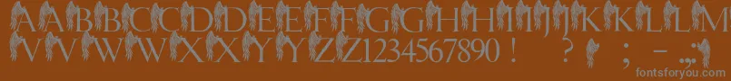 フォントJmhAngelusI – 茶色の背景に灰色の文字