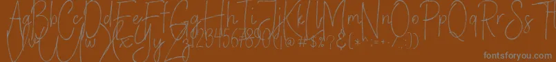 VerticalBrushyFree Font – Gray Fonts on Brown Background