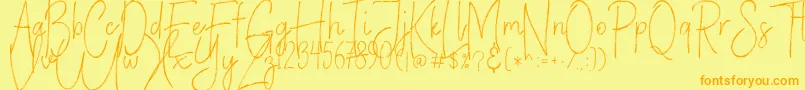 Fonte VerticalBrushyFree – fontes laranjas em um fundo amarelo