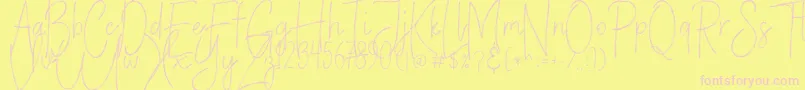 VerticalBrushyFree Font – Pink Fonts on Yellow Background