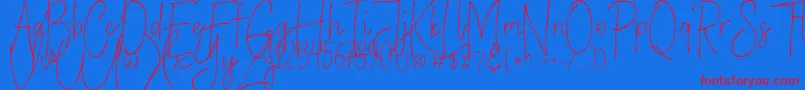 VerticalBrushyFree-fontti – punaiset fontit sinisellä taustalla
