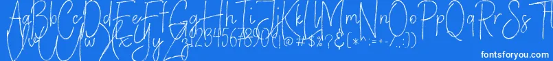 VerticalBrushyFree-Schriftart – Weiße Schriften auf blauem Hintergrund