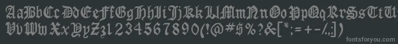 フォントAnglossk – 黒い背景に灰色の文字