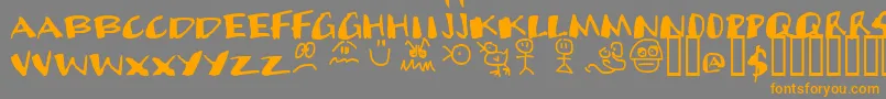 フォントCands – オレンジの文字は灰色の背景にあります。