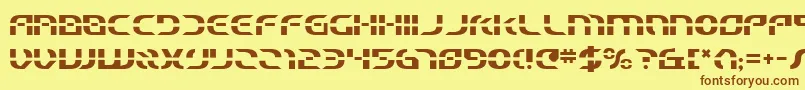 フォントStarfighterBeta – 茶色の文字が黄色の背景にあります。