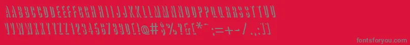 フォントGreatreliefbackslantRegular – 赤い背景に灰色の文字